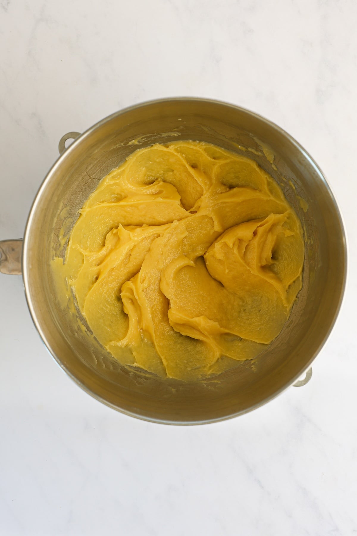 mixing bowl with dough after egg and vanilla mixed in