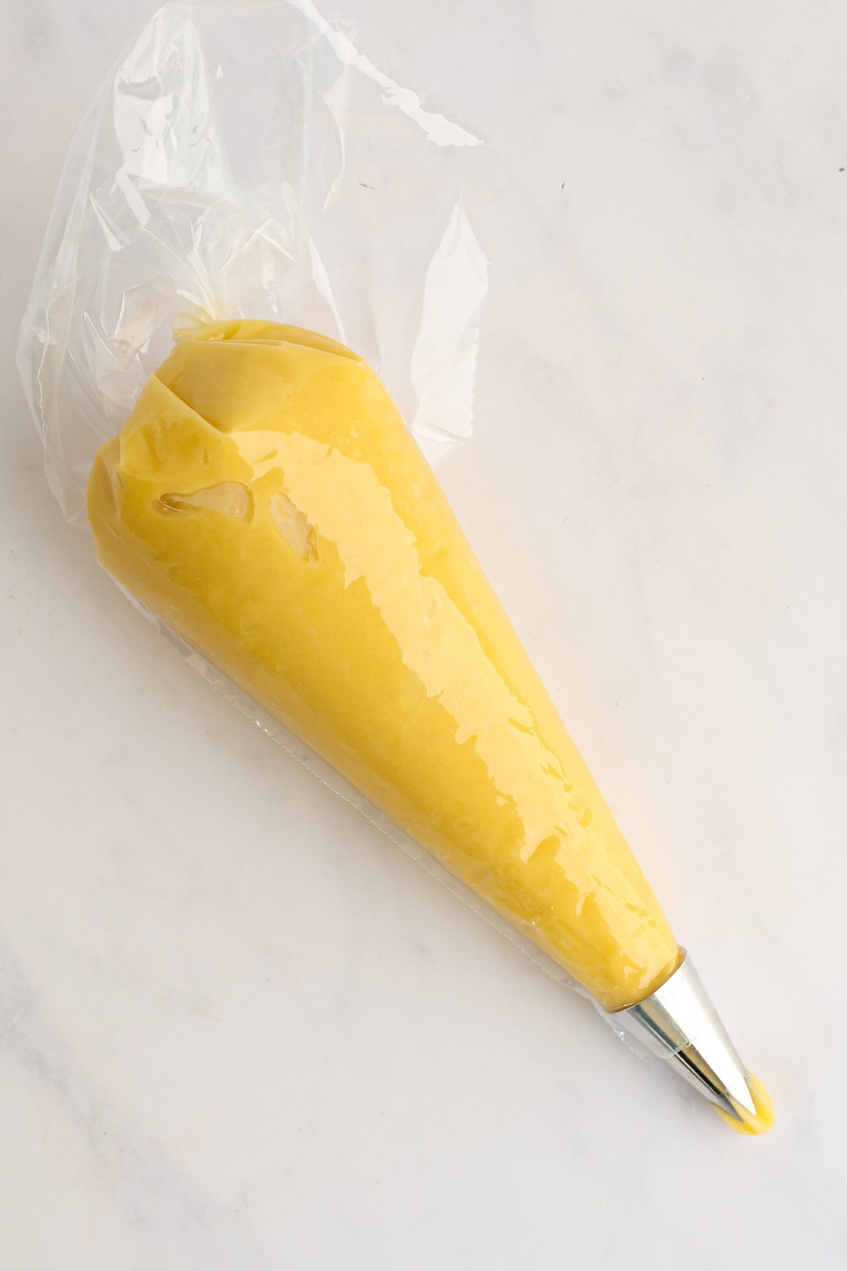 churro dough in piping bag with large star tip
