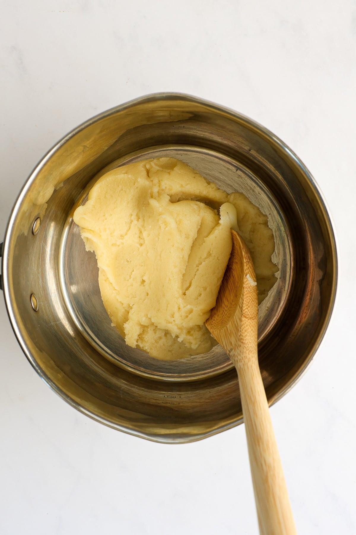 water, milk, butter, sugar, salt, and flour combined into smooth ball in medium saucepan
