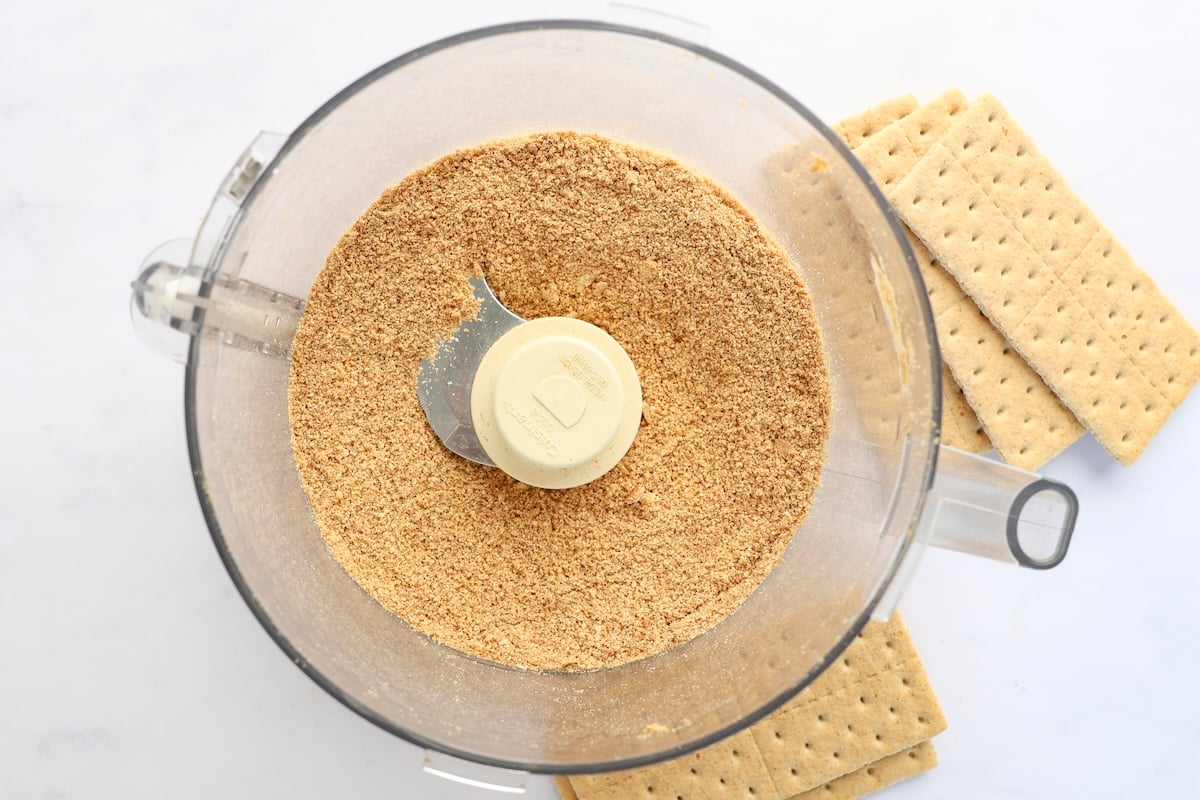 food processor bowl with graham cracker crumbs