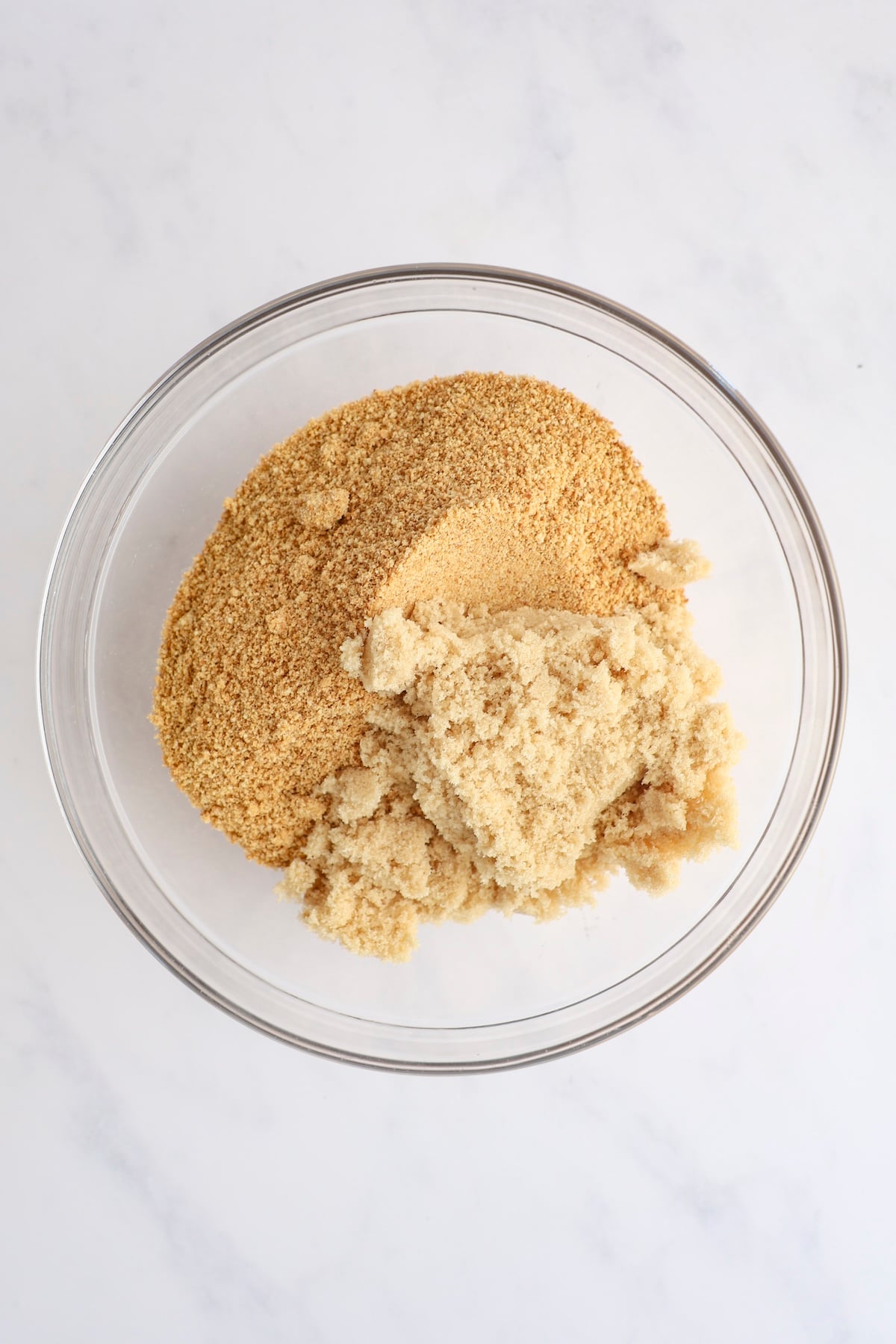 graham cracker crumbs, brown sugar, and butter in medium bowl