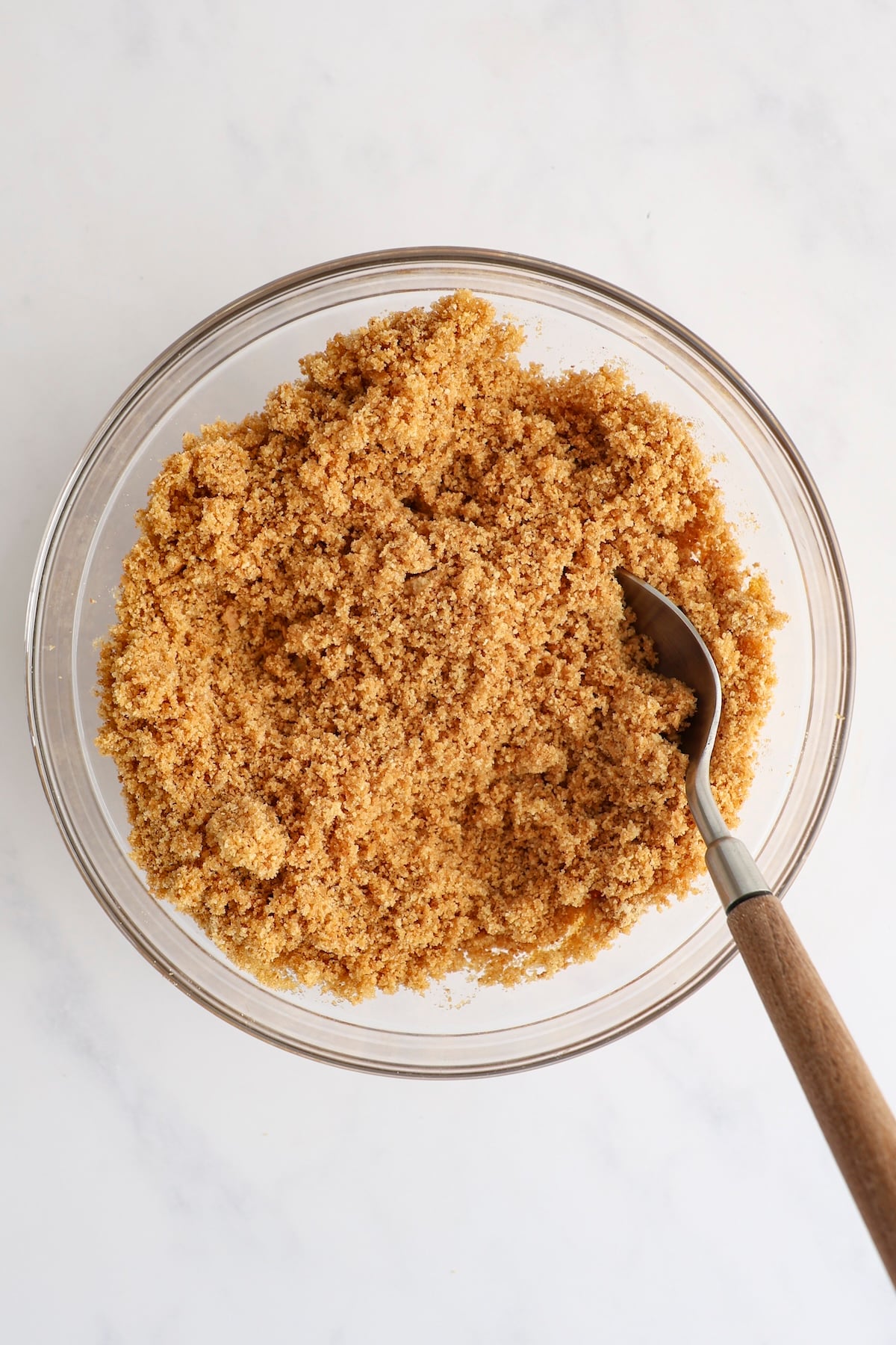 graham cracker crumbs, brown sugar, and butter combined in medium bowl