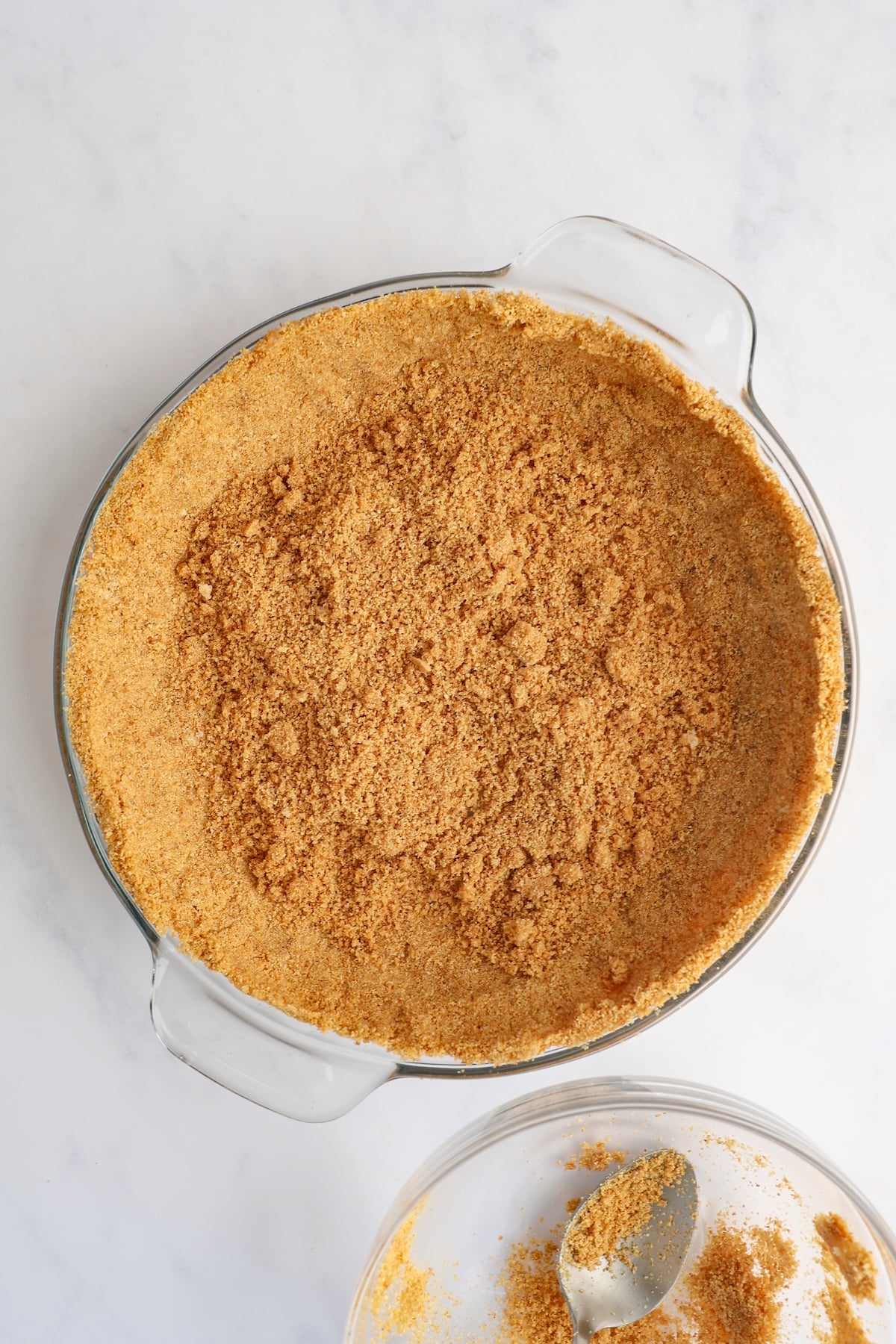 loose graham cracker crust crumbs covering entire pan pan