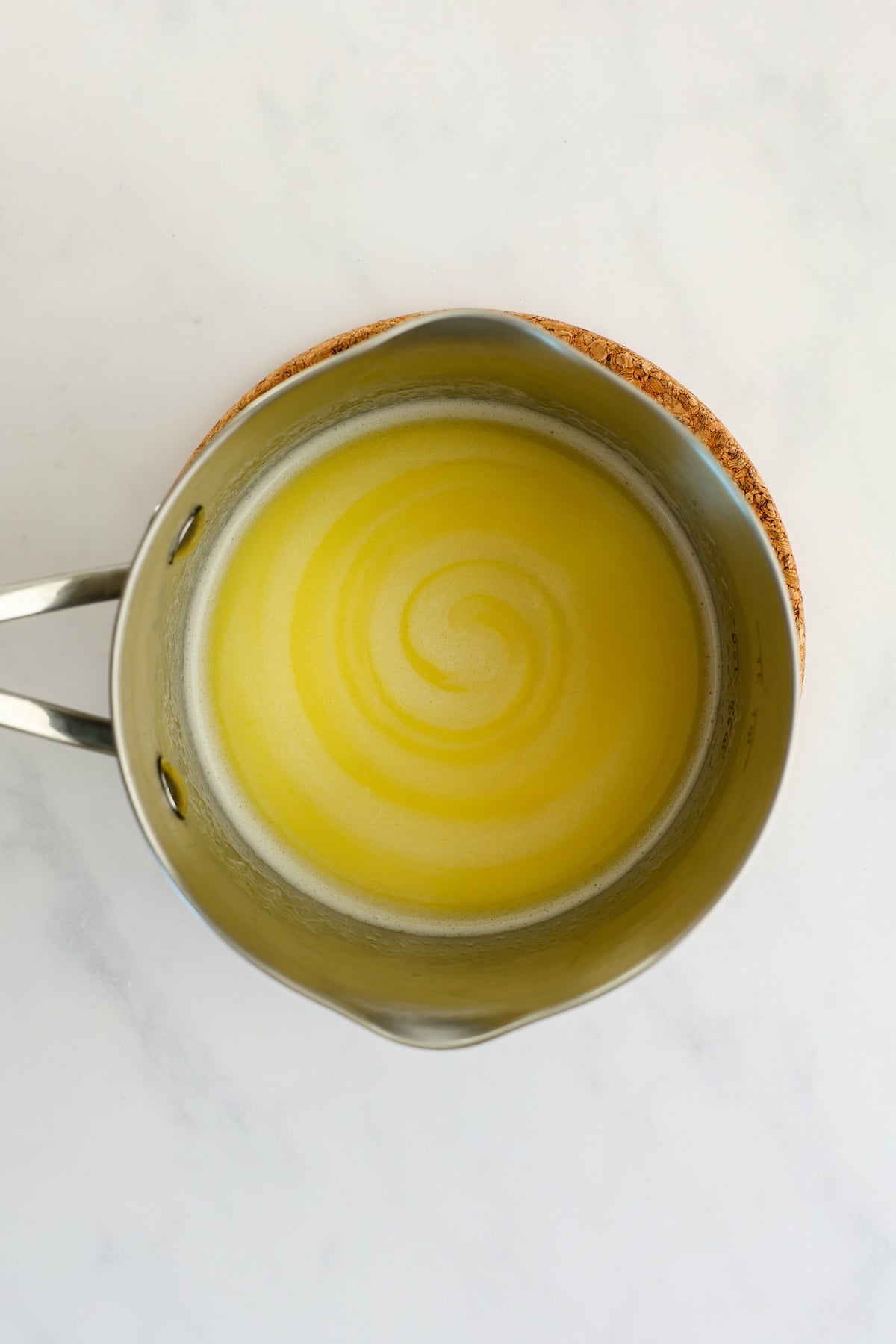 medium saucepan with water, milk, butter, sugar, and salt