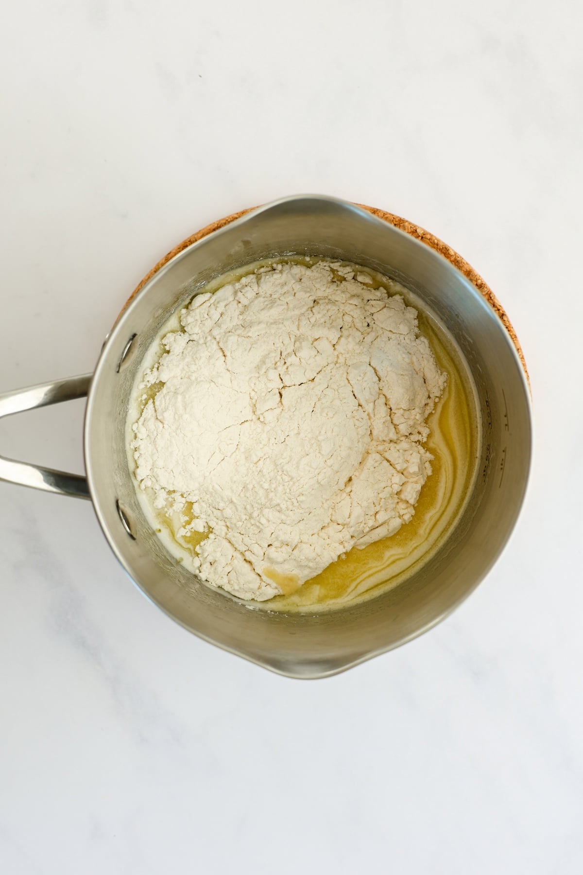 medium saucepan with flour added to milk/butter mixture