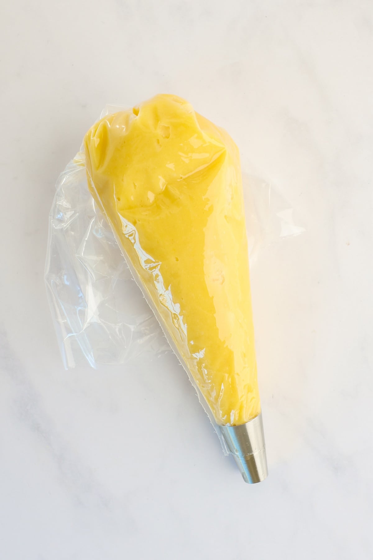 dough in piping bag with 1/2-inch round tip