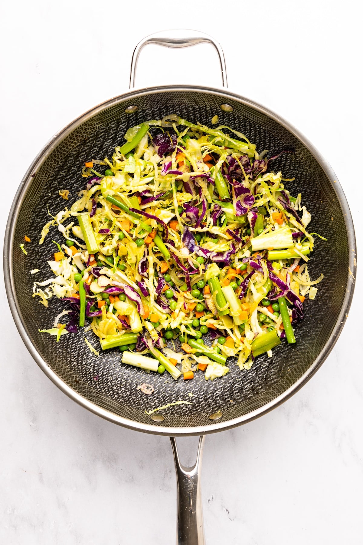 nonstick garlic, ginger and shallots with cooked scallions, vegetables, and turmeric