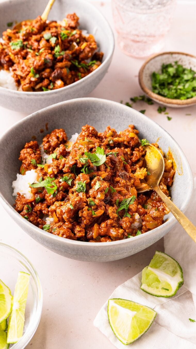 gray bowl with cuban picadillo served over white rice