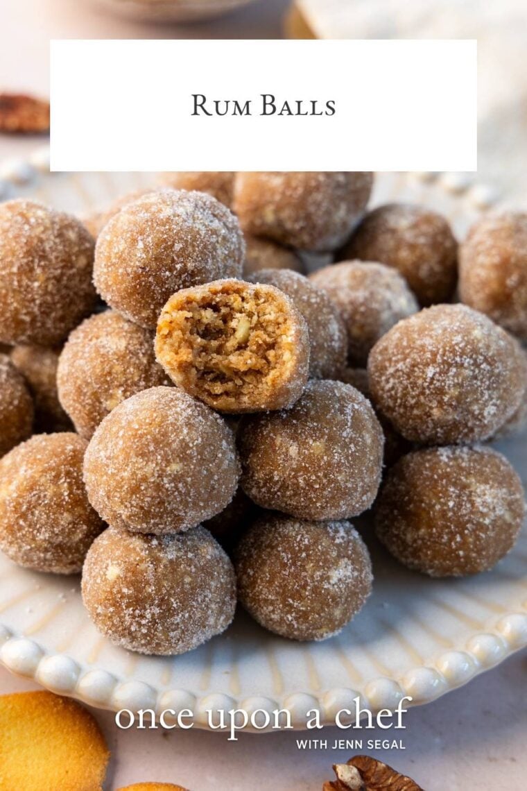 rum balls piled on decorative white plate