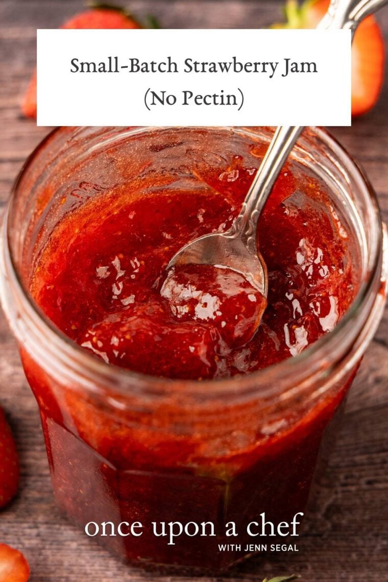 strawberry jam in far with spoon in it