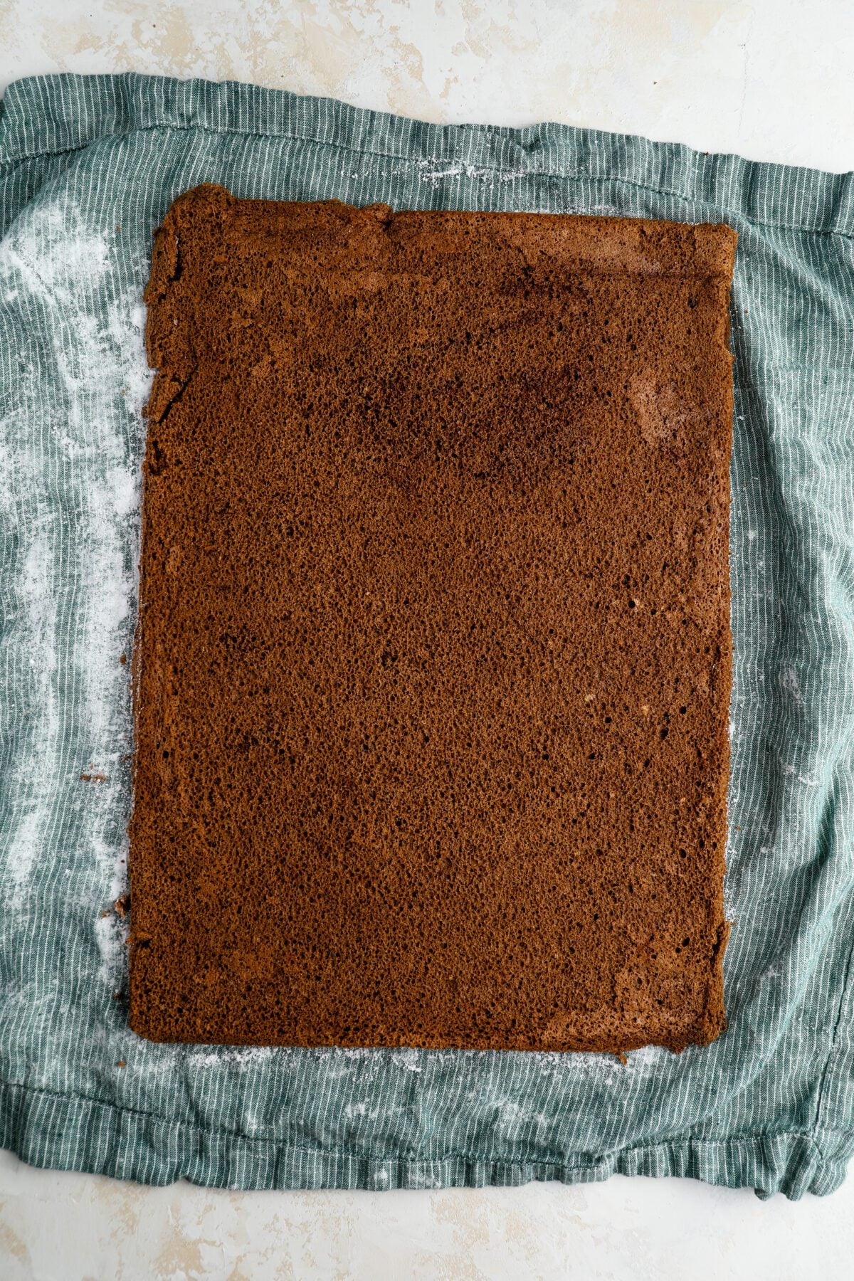 baked cake on clean kitchen towel