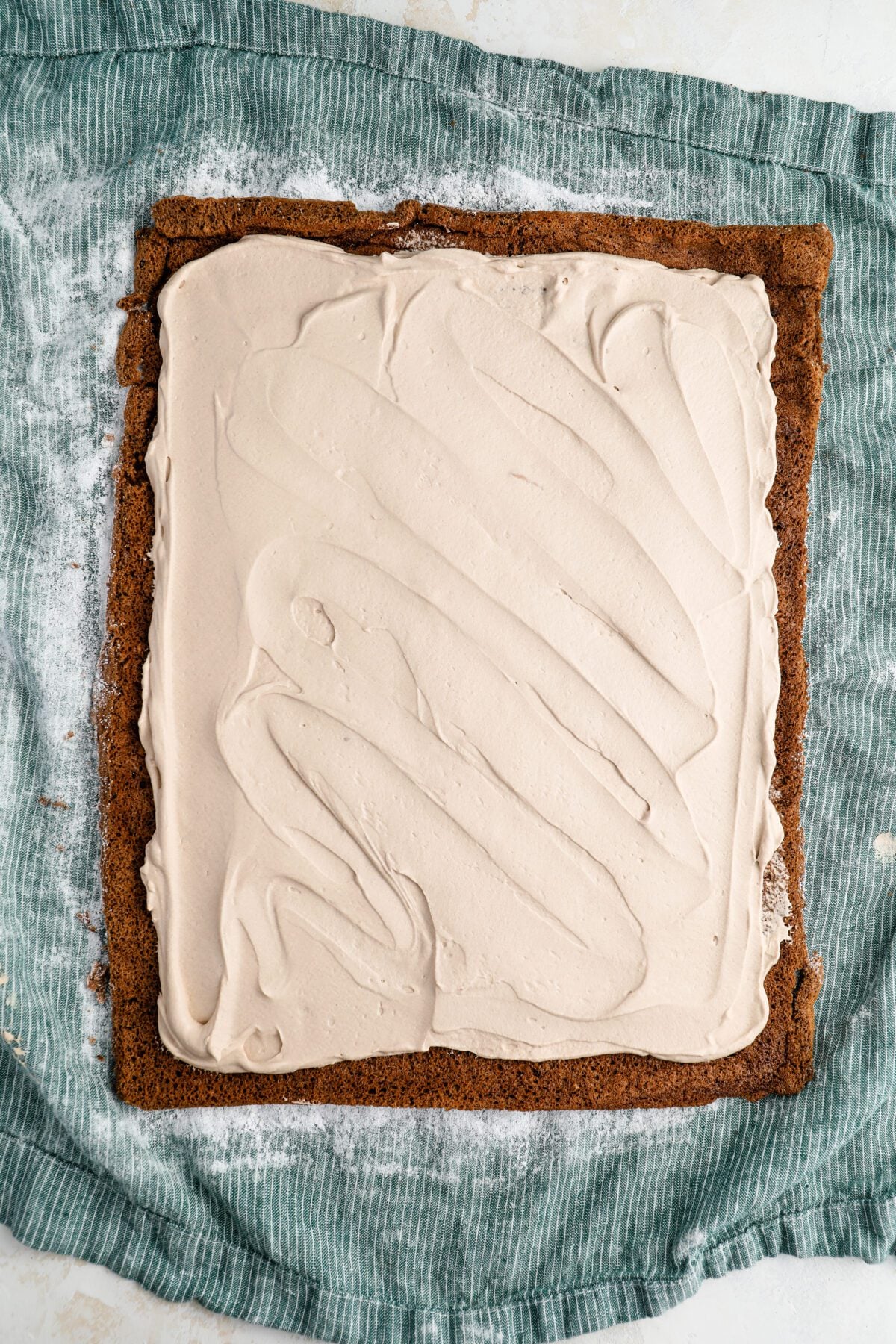 cake with filling spread evenly on top