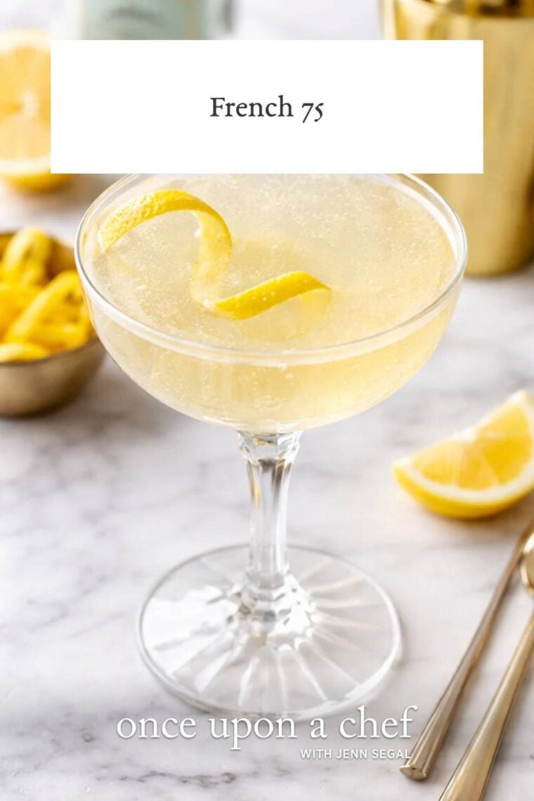 glass with French 75 cocktail with twist
