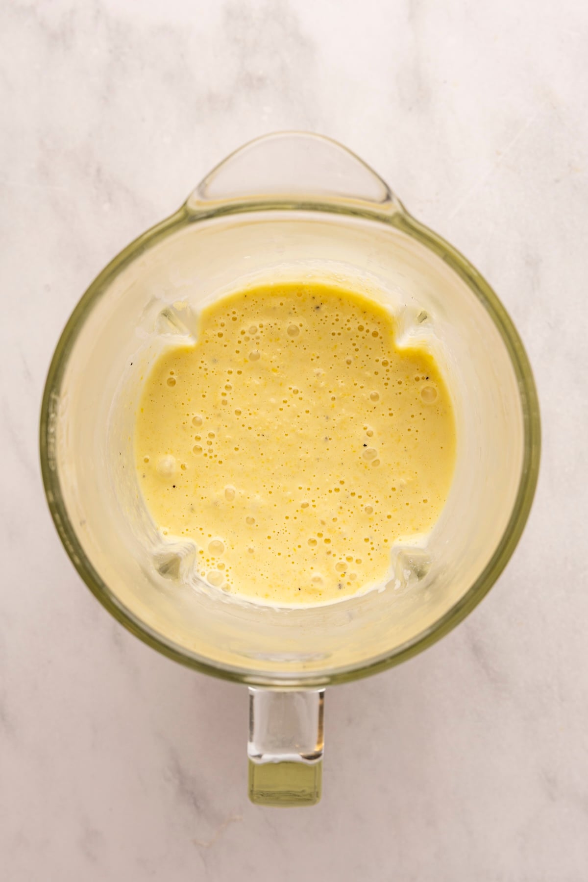 pureed corn, corn, cream, salt, and pepper in blender