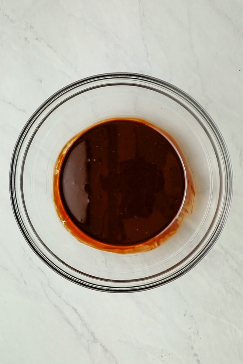 Melted chocolate and butter in bowl.