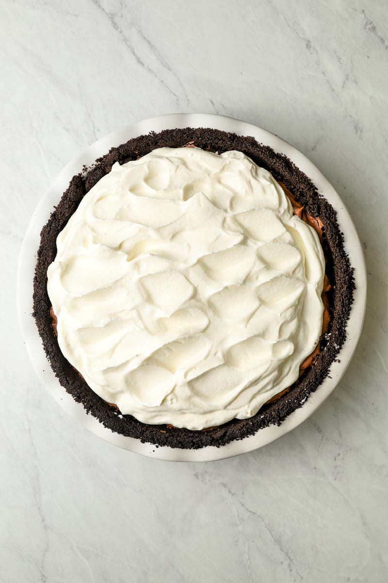Whipped cream added to cover chocolate mousse layer.