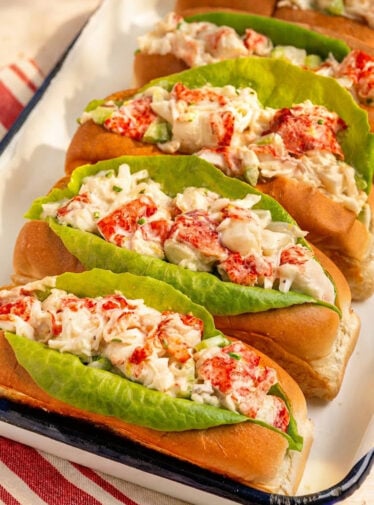 New England lobster rolls on platter.