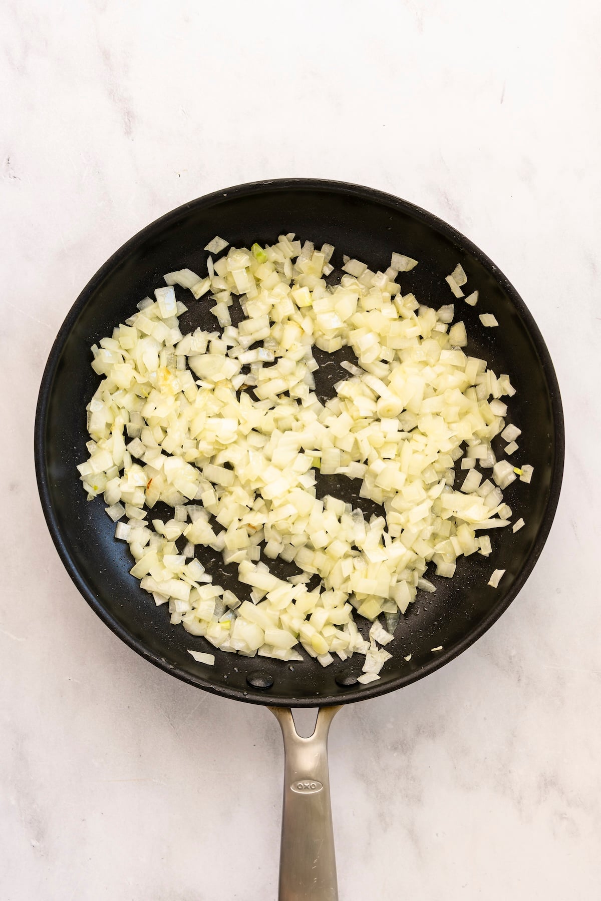 medium skillet with sauteed onion and garlic