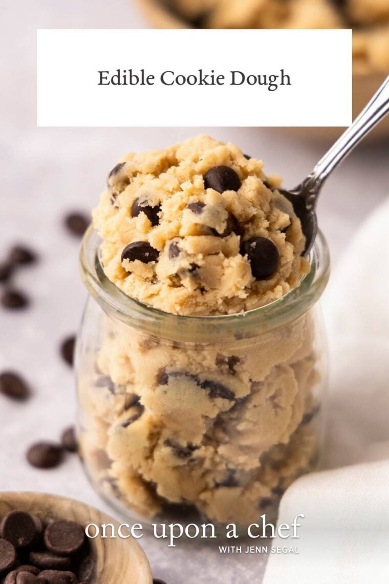 jar of edible cookie dough with spoon stuck in it
