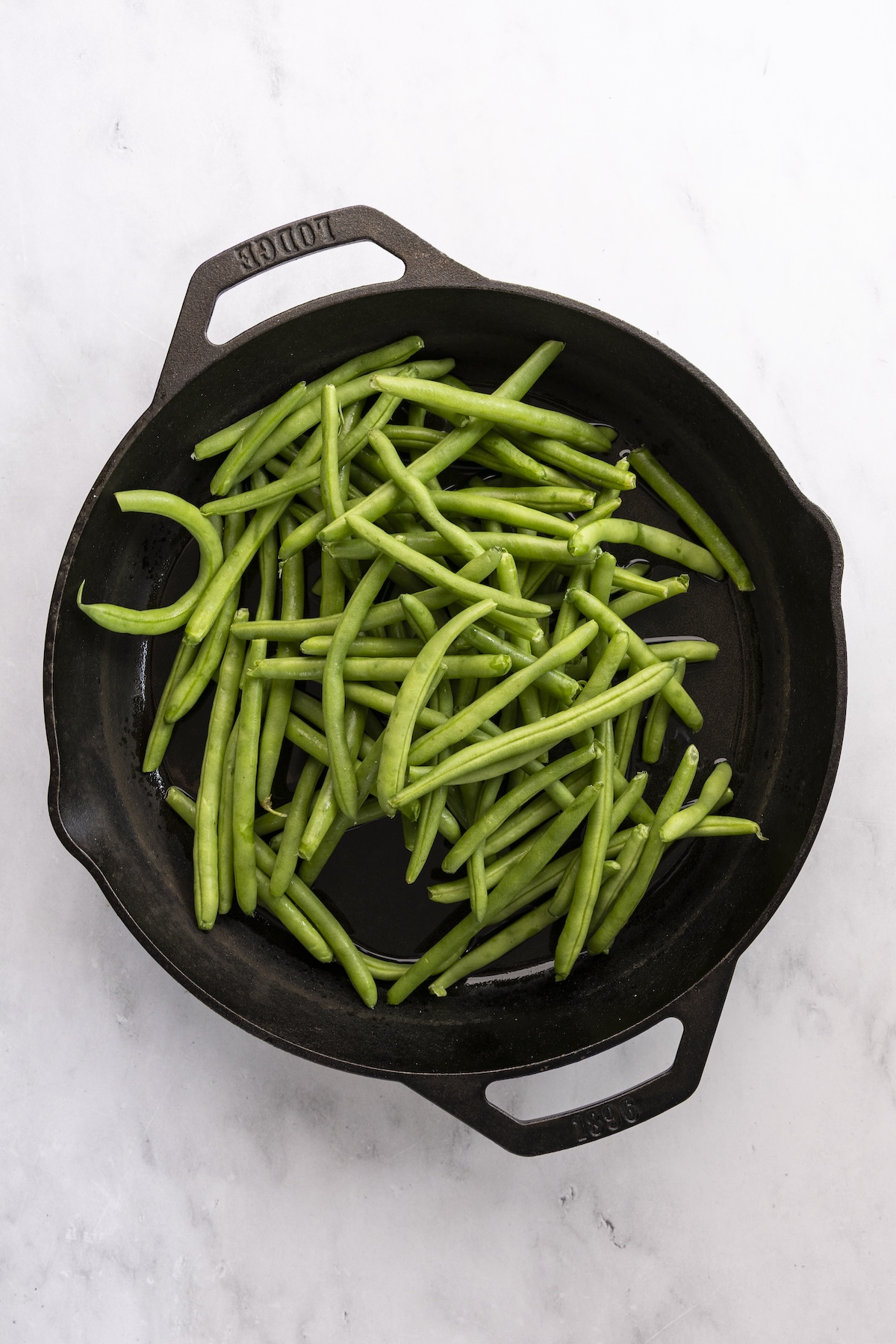 Green beans in cast iron skillet.