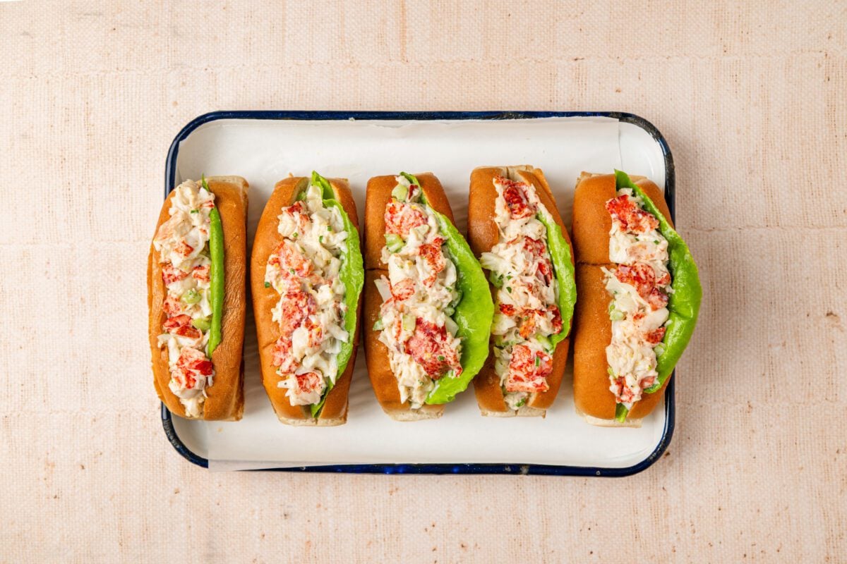 finished lobster rolls on white tray
