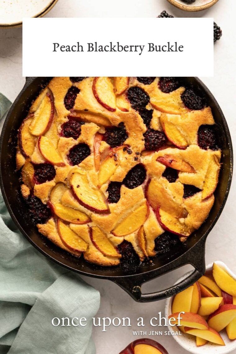 peach blackberry buckle in cast iron skillet on white counter