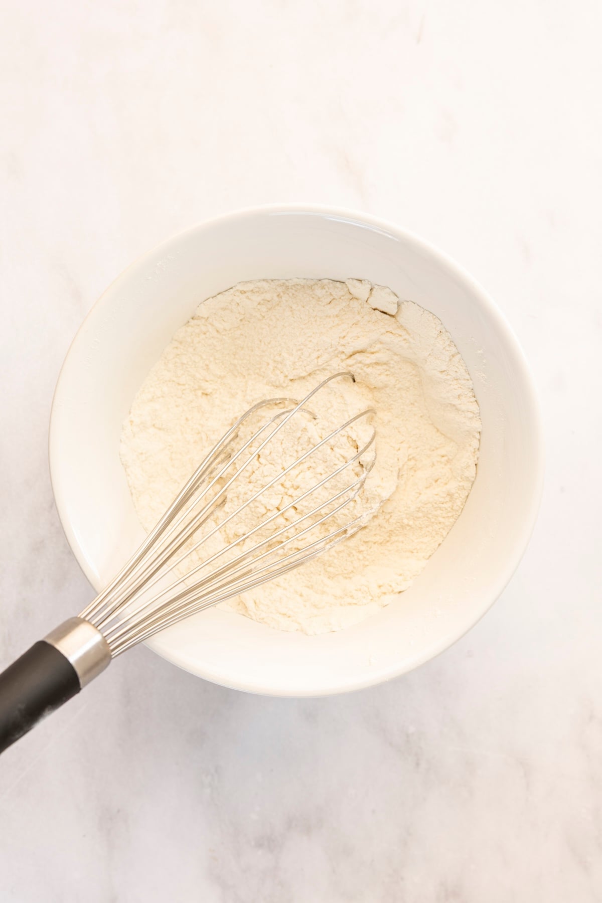 medium bowl with flour, granulated sugar, baking powder, and salt